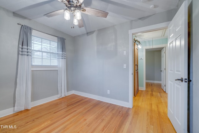 unfurnished room featuring ceiling fan and light hardwood / wood-style floors