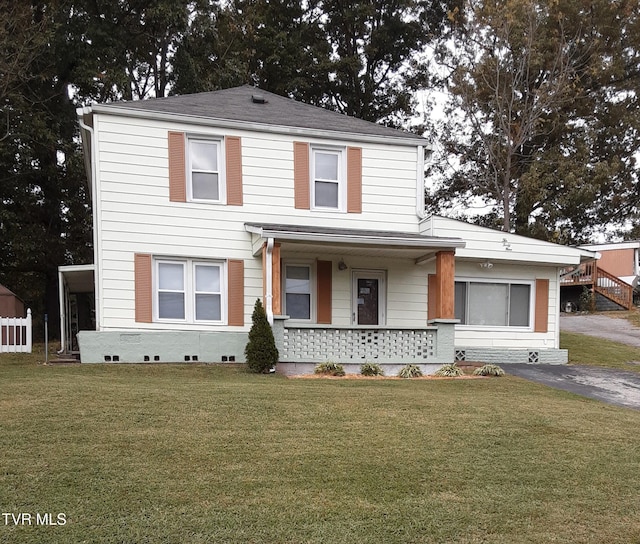 front facade featuring a front yard and a porch