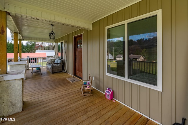 wooden terrace with covered porch