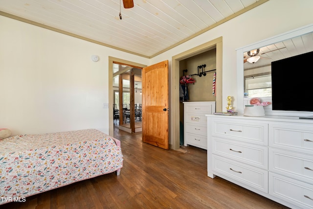 bedroom with ceiling fan, wood ceiling, dark hardwood / wood-style floors, and ornamental molding