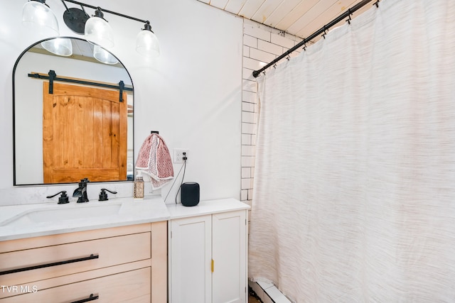 bathroom with vanity and a shower with shower curtain