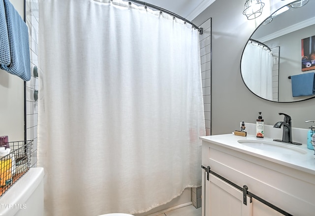 bathroom featuring vanity, toilet, and crown molding