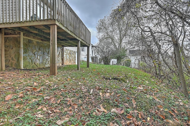 view of yard featuring a deck