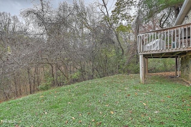 view of yard with a deck