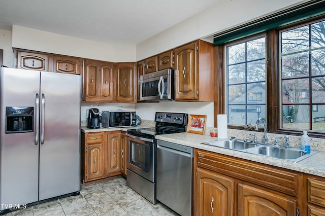 kitchen with sink and stainless steel appliances