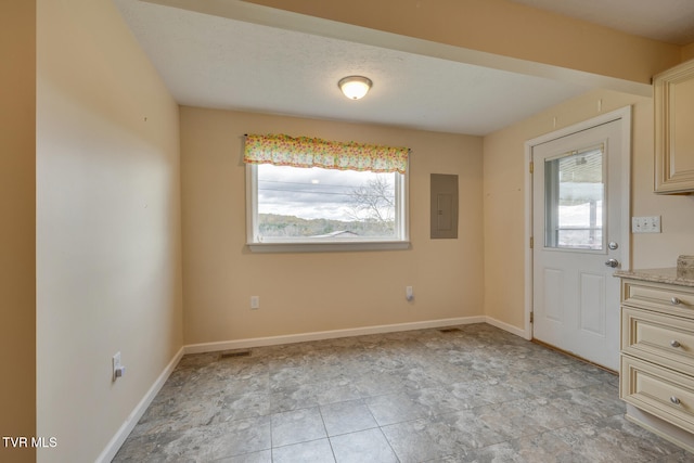 foyer featuring electric panel