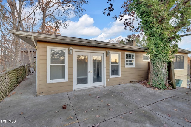 rear view of house featuring french doors and a patio