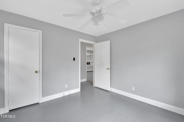 empty room with ceiling fan and a baseboard heating unit