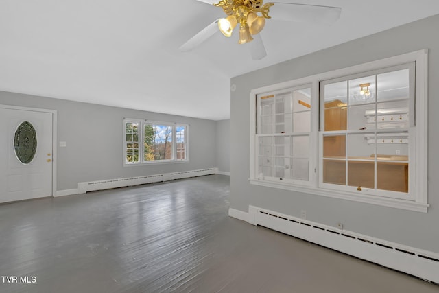 unfurnished living room with ceiling fan, hardwood / wood-style floors, and a baseboard radiator