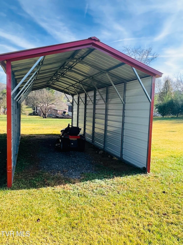 view of vehicle parking featuring a carport and a lawn