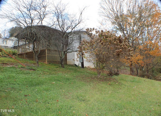 view of yard with a wooden deck