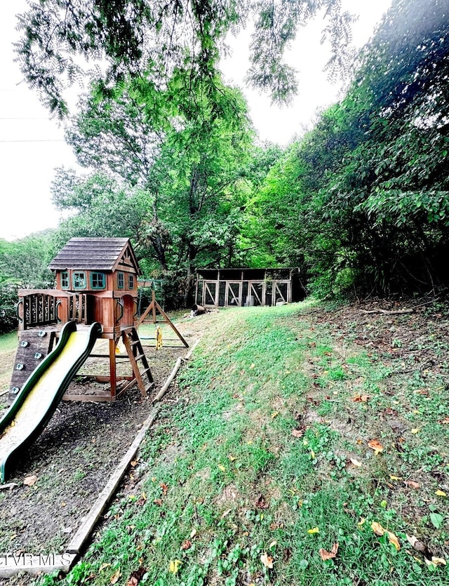 view of yard featuring a playground