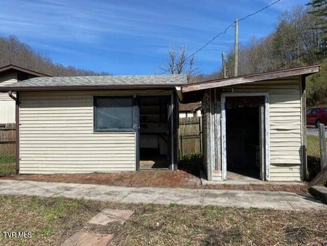 5332 Stonega Rd, Appalachia, VA 24216 - rear view of house featuring roof with shingles