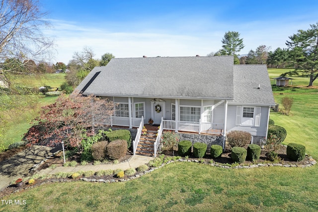 view of front of home featuring a front lawn and covered porch