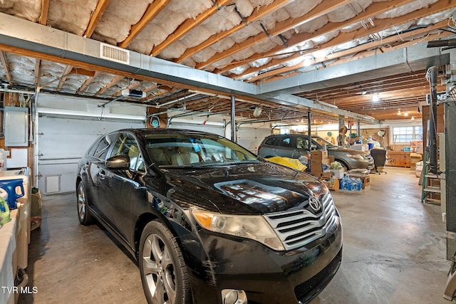 garage featuring electric panel