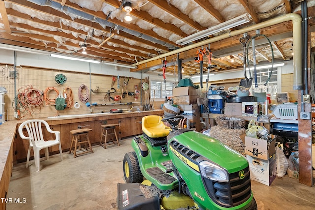 interior space featuring a workshop area