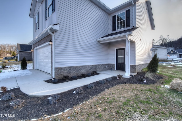 view of property exterior featuring a garage