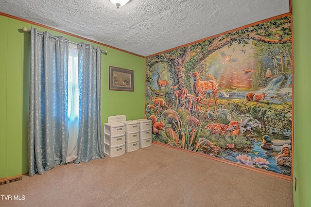 carpeted bedroom featuring a textured ceiling and ornamental molding