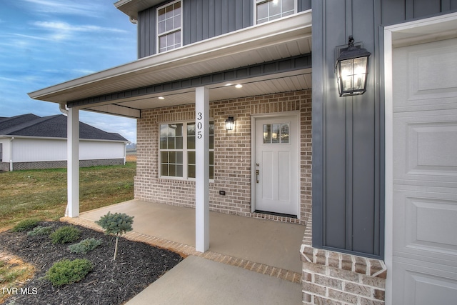 entrance to property with covered porch