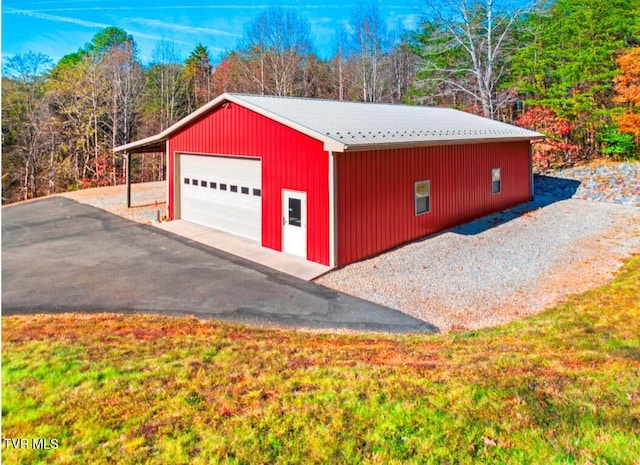 garage with a lawn