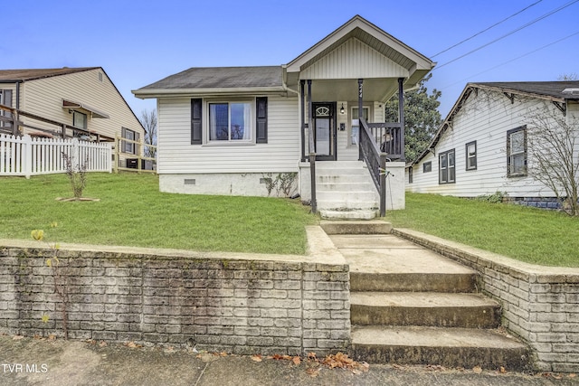 bungalow-style home with a porch and a front yard