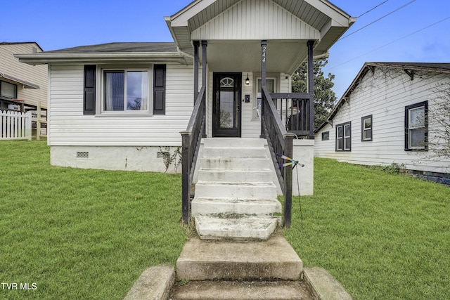 view of front facade with a porch and a front yard