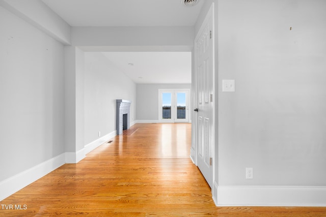 hall featuring light wood-type flooring