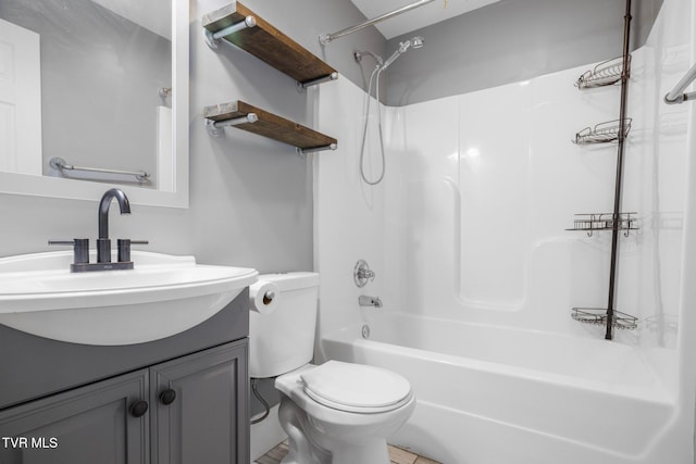 full bathroom with vanity,  shower combination, and toilet