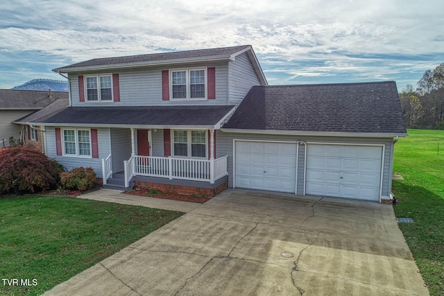 front of property with covered porch, a garage, and a front lawn