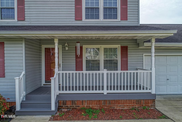 doorway to property featuring a garage