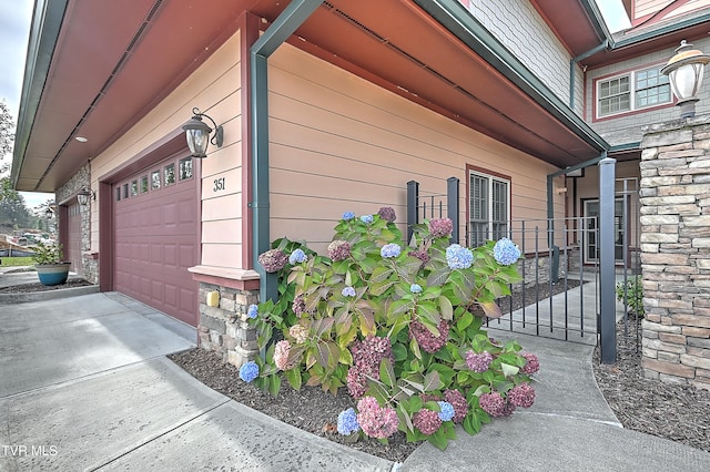 view of home's exterior with a garage