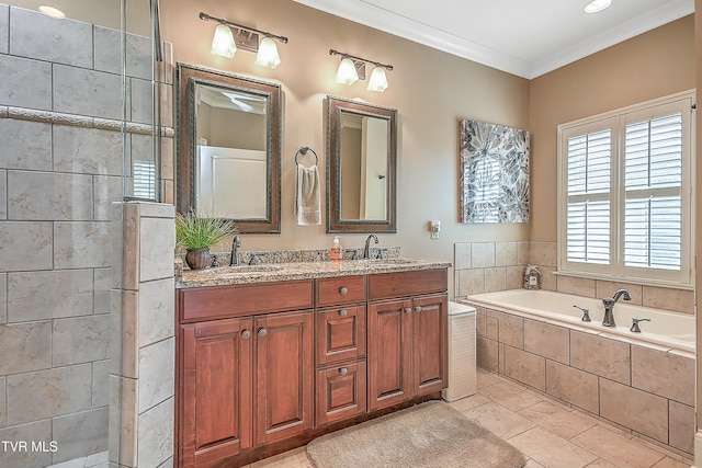 bathroom with tile patterned floors, vanity, independent shower and bath, and ornamental molding