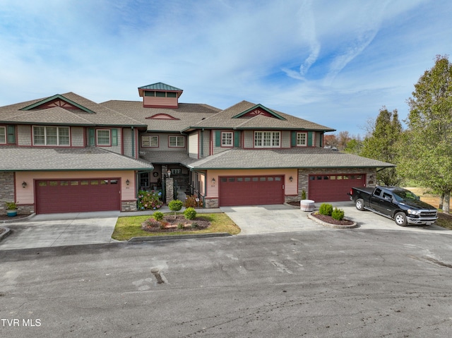 view of front of property with a garage