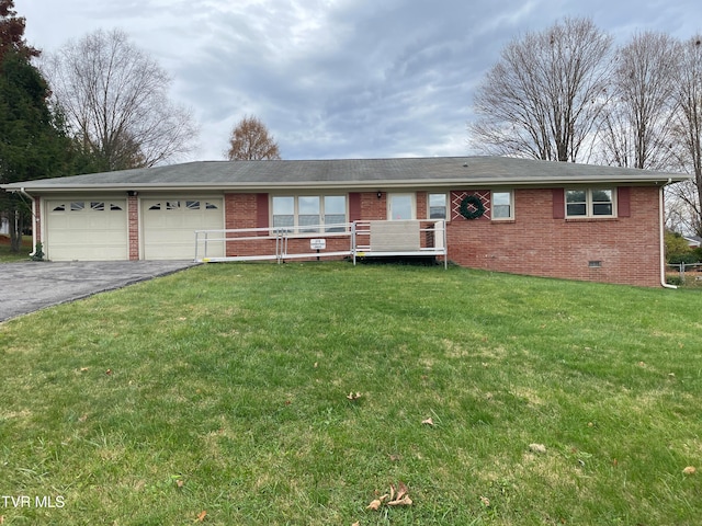 single story home featuring a front yard and a garage