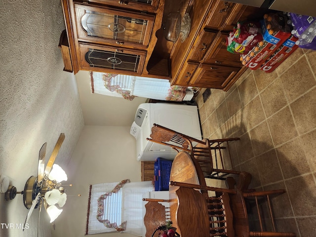 kitchen featuring tile walls