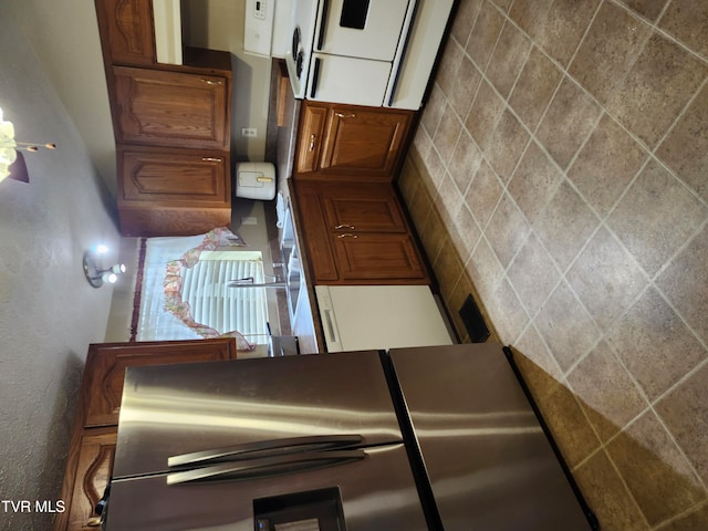 kitchen with stainless steel fridge