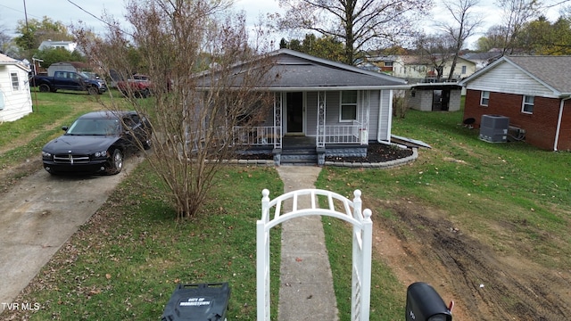 bungalow-style home with covered porch and central AC