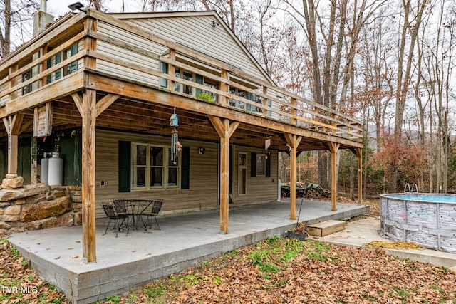 exterior space featuring a pool side deck