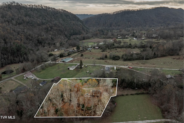 aerial view at dusk with a mountain view