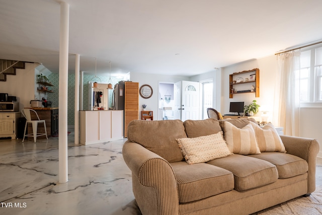 living room with plenty of natural light