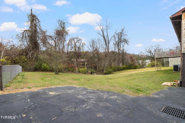 view of yard with central AC