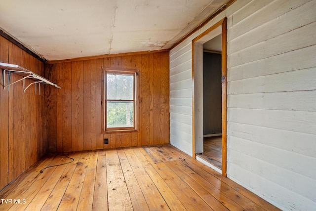 1667 Bristol Caverns Hwy, Bristol, TN 37620 - unfurnished room with light wood-style flooring and wooden walls