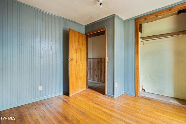 1667 Bristol Caverns Hwy, Bristol, TN 37620 - unfurnished bedroom with a closet, hardwood / wood-style floors, and baseboards