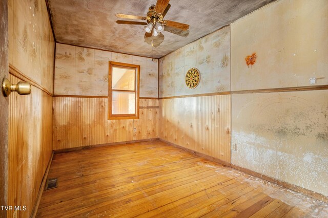 1667 Bristol Caverns Hwy, Bristol, TN 37620 - unfurnished room featuring hardwood / wood-style flooring and ceiling fan