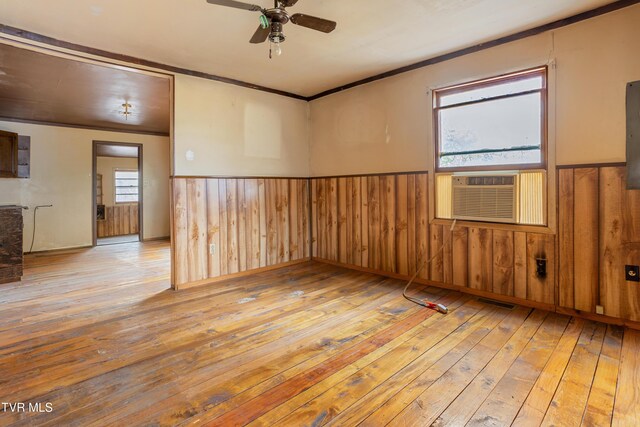1667 Bristol Caverns Hwy, Bristol, TN 37620 - unfurnished room with wood-type flooring, wainscoting, cooling unit, crown molding, and ceiling fan