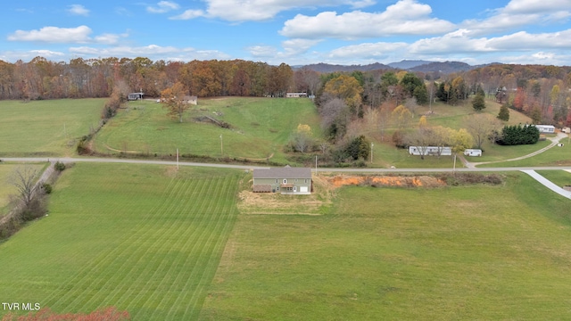 aerial view featuring a mountain view and a rural view