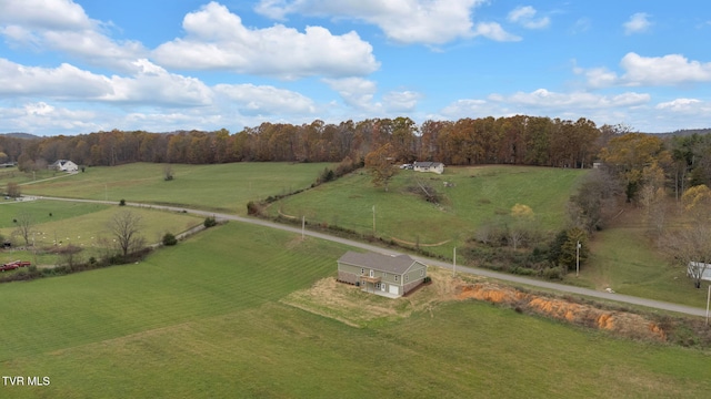 birds eye view of property featuring a rural view