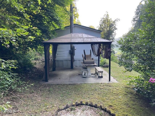 exterior space featuring a gazebo and a patio area