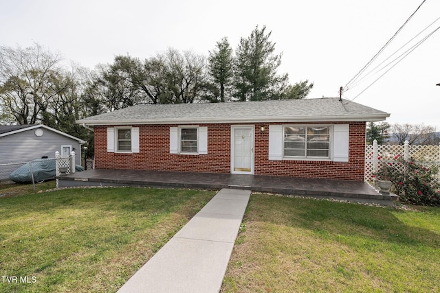 view of front of property with a front lawn