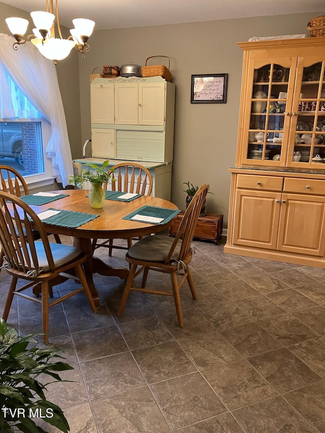 dining area with a chandelier